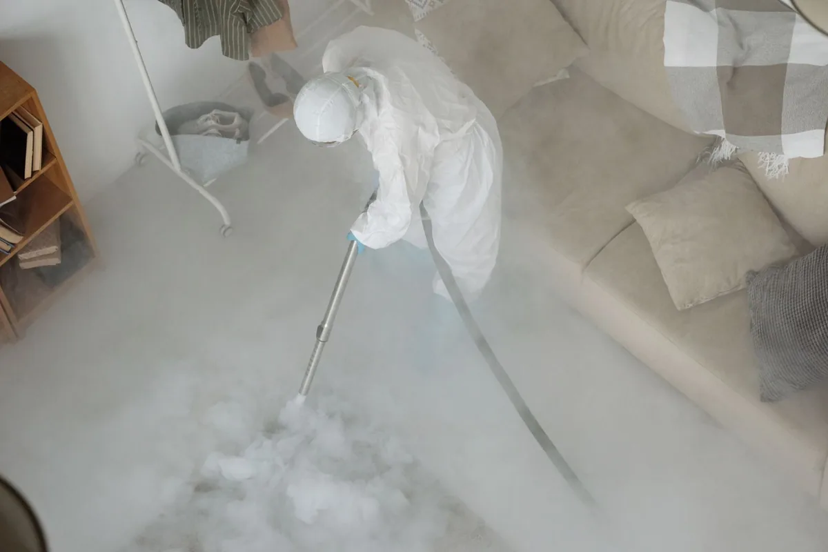 Biohazard cleanup technician in protective equipment, Wind Point, WI